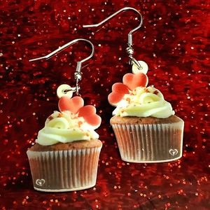 Acrylic Valentine's Day earrings shaped as  cupcakes & 💕 on the image.